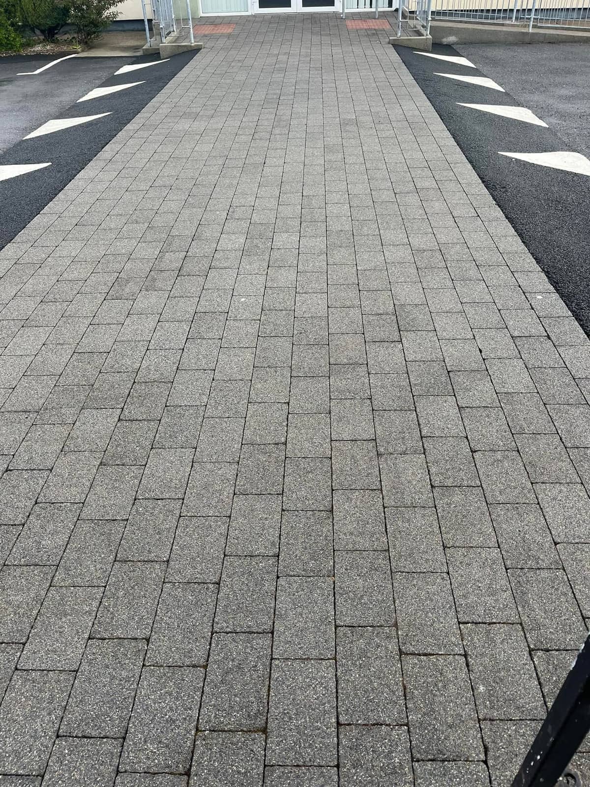 Commercial block-paved walkway, freshly cleaned