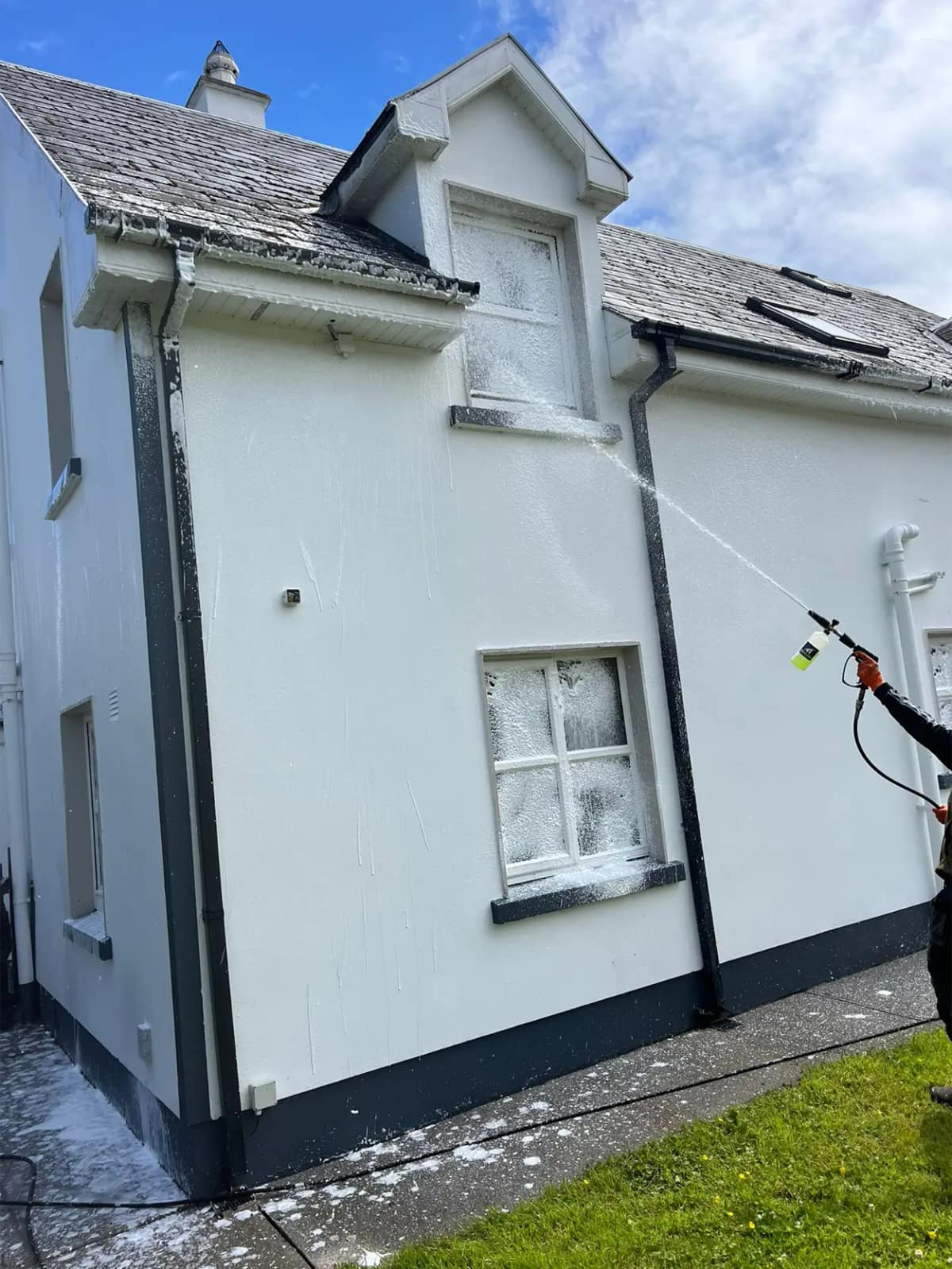 House exterior soft wash in progress