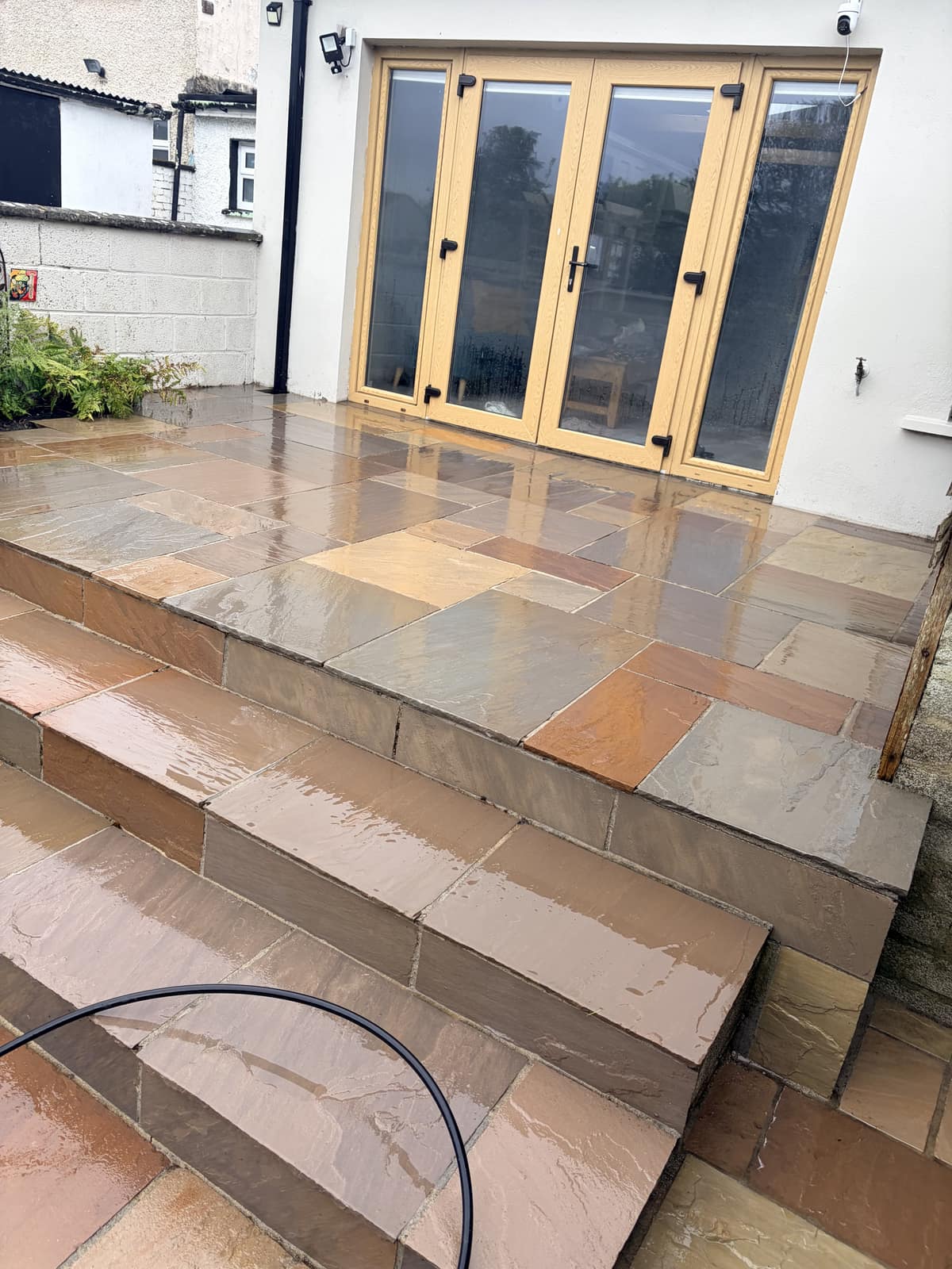 Sandstone patio, freshly power washed